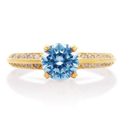 Zlatý prsten pravý blue topaz Aqua